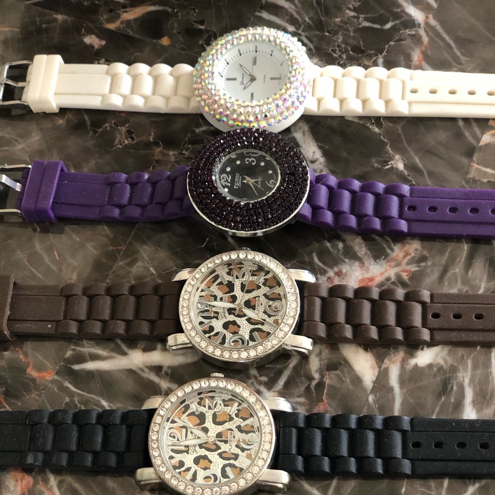 This lot of five designer watches
